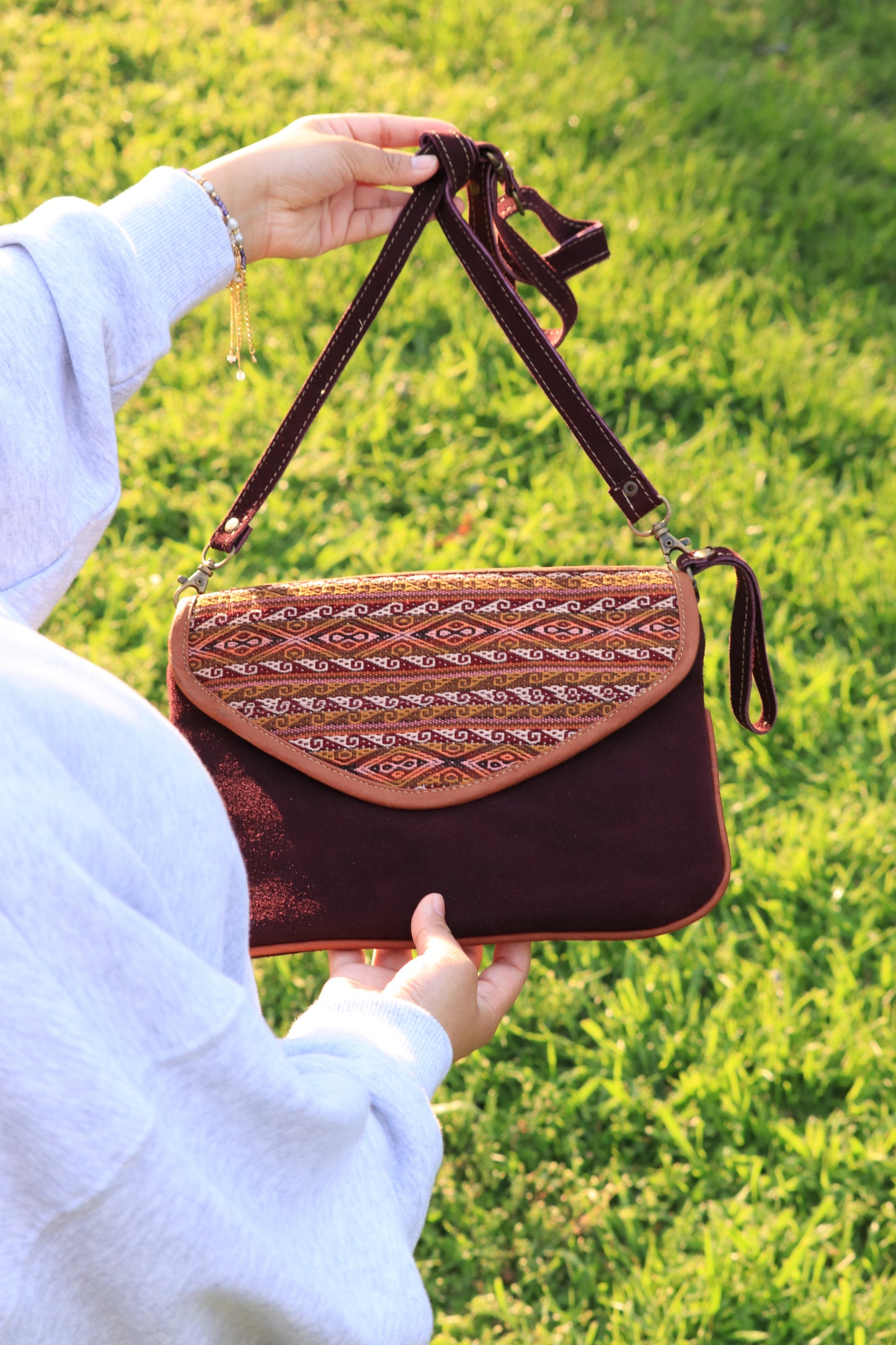 Maroon leather cross body bag