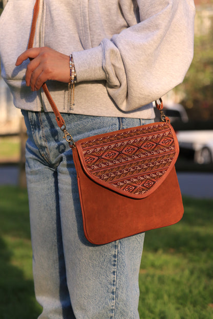 Brown leather cross body bag