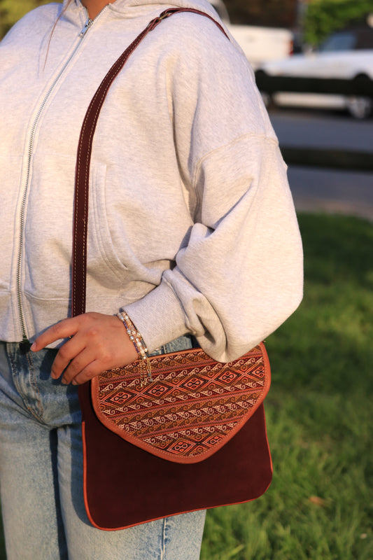 Maroon leather cross body bag