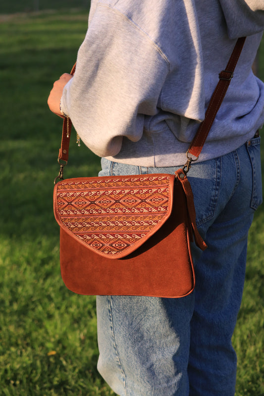 Brown leather cross body bag